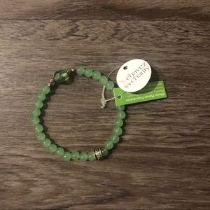 Green beaded bracelet.